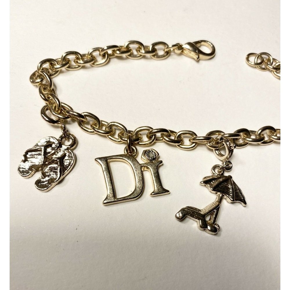 Diamond International Gold Tone Charm Bracelet